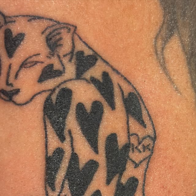 Heart panther tattoo by Kyle at Maui Tattoos