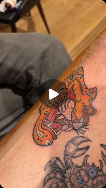 Tiger head tattoo by Kyle at Maui Tattoos